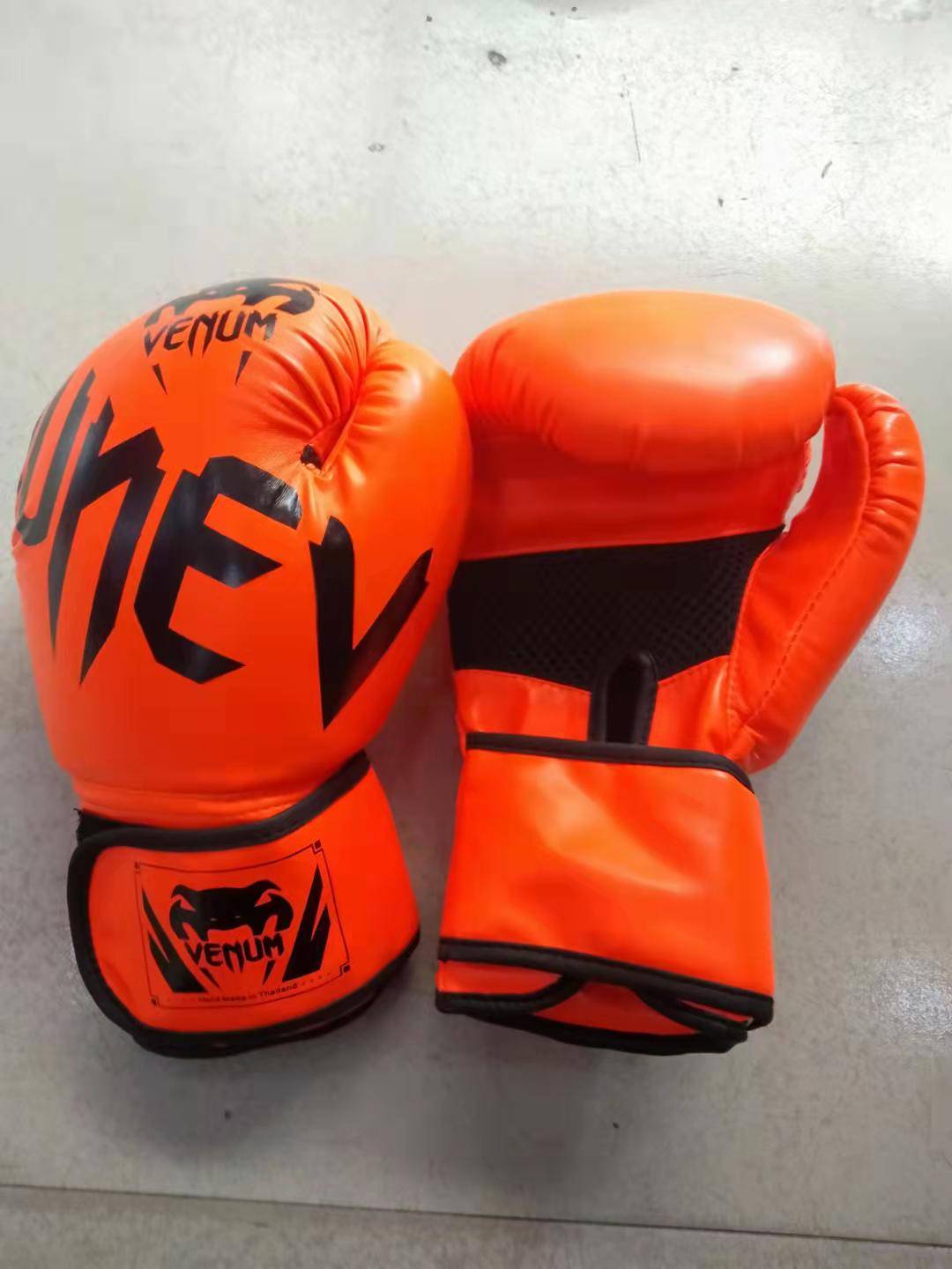 Orange adult boxing gloves